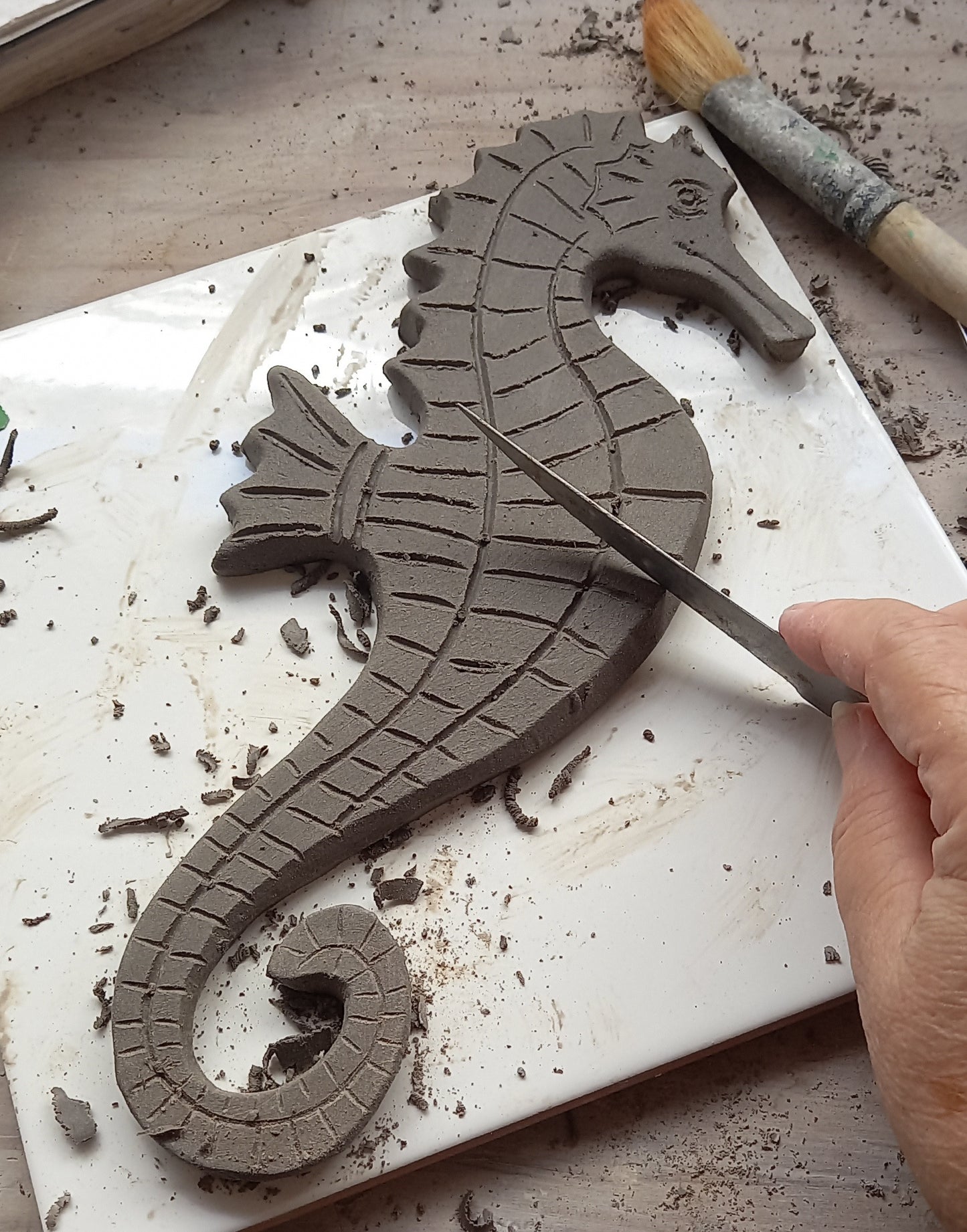 Bizcocho de cerámica de caballito de mar (para pintar)